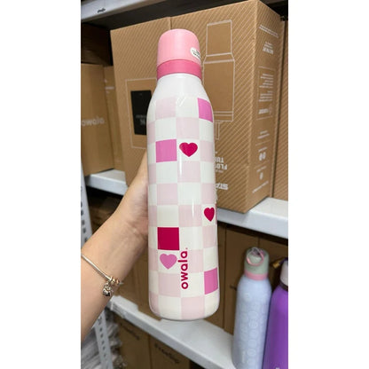 Owala FreeSip Twist bottle in the limited edition "Check Me Out" colorway